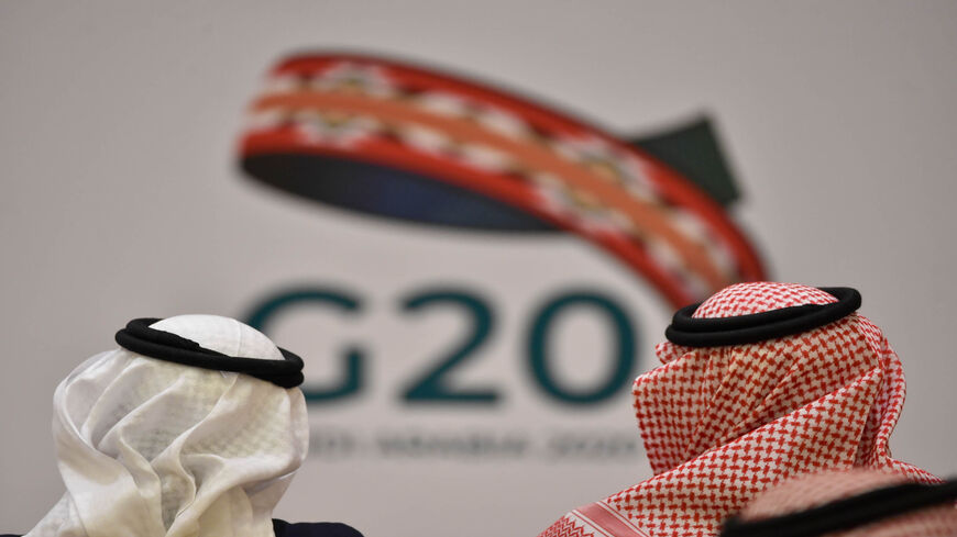 Unidentified guests attend a meeting of Finance ministers and central bank governors of the G20 nations in the Saudi capital Riyadh on February 23, 2020. - The deadly coronavirus epidemic will dent global growth, the IMF warned, as G20 finance ministers and central bank governors weighed its economic ripple effects at a two-day gathering in Riyadh. (Photo by FAYEZ NURELDINE / AFP) (Photo by FAYEZ NURELDINE/AFP via Getty Images)