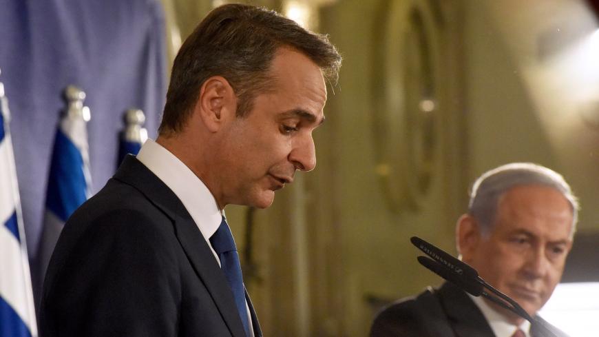 Israeli Prime Minister Benjamin Netanyahu (R) and his Greek counterpart Kyriakos Mitsotakis issue joint statements in Jerusalem on June 16, 2020. (Photo by DEBBIE HILL / POOL / AFP) (Photo by DEBBIE HILL/POOL/AFP via Getty Images)