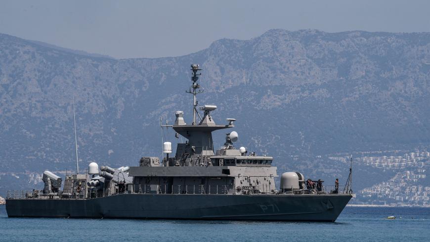The Hellenic Navy Roussen or Super Vita class Fast Missile Patrol Boat P 71 HS Ritsos is seen off the tiny Greek island of Kastellorizo, officially Megisti, the most southeastern inhabited Greek island in the Dodecanese, situated two kilometers off the south coast of Turkey where the Kas Turkish resort can be seen on August 28, 2020. (Photo by Louisa GOULIAMAKI / AFP) (Photo by LOUISA GOULIAMAKI/AFP via Getty Images)