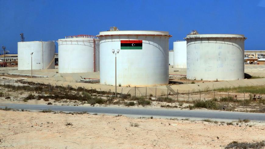 A picture taken on September 24, 2020 shows a partial view of the Brega oil port some 270kms west of Libya's eastern city of Benghazi. - Libyas state oil firm lifted force majeure on what it deemed secure oil ports and facilities on September 20, a day after strongman Khalifa Haftar said he was lifting a blockade on oilfields and ports. The blockade, which has resulted in more than $9.8 billion in lost revenue according to the state-run National Oil Corporation (NOC), has exacerbated electricity and fuel sh