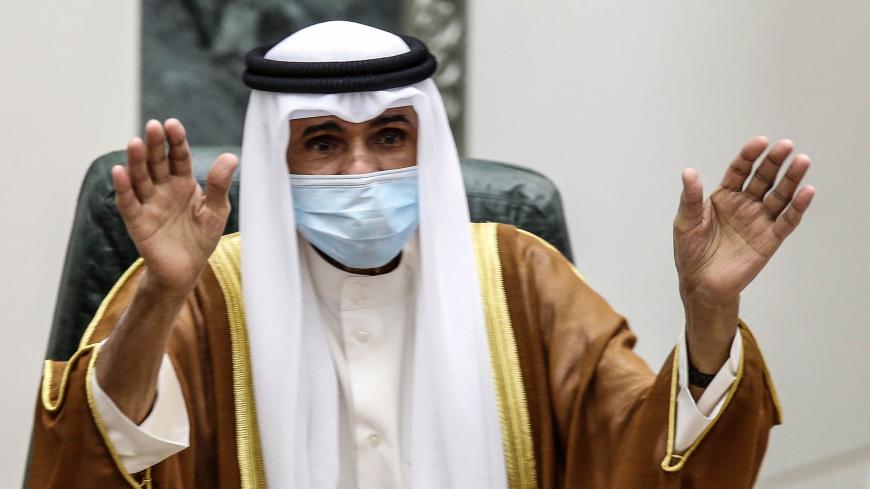 Sheikh Nawaf al-Ahmad Al-Sabah salutes the crowd after being sworn in as Kuwait's new Emir at the National Assembly in Kuwait City on September 30, 2020. - Kuwait today swore in its new emir, Sheikh Nawaf al-Ahmad Al-Sabah, after the death of his half-brother, Sheikh Sabah, who died in the US at the age of 91. (Photo by Yasser Al-Zayyat / AFP) (Photo by YASSER AL-ZAYYAT/AFP via Getty Images)