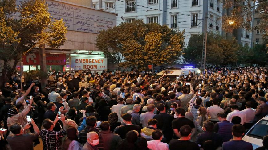Fans of Iranian singer, instrumentalist and composer Mohammad-Reza Shajarian gather outside the Jam hospital in Tehran where he has died on October 8, 2020. - Singer, instrumentalist and composer Mohammad-Reza Shajarian, who died today aged 80, embodied traditional and classical Iranian music for more than half a century both at home and abroad. A national treasure in his homeland, Shajarian nevertheless maintained difficult relations with the authorities in Tehran throughout his career, first under the rei