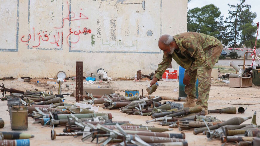 Military engineers of the UN-recognised Libyan Government of National Accord (GNA) sort ammunition and explosives for safe disposal in the Libyan capital Tripoli on October 12, 2020. (Photo by Mahmud TURKIA / AFP) (Photo by MAHMUD TURKIA/AFP via Getty Images)
