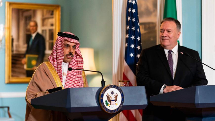 Secretary of State Mike Pompeo, right, listens to Saudi Minister of Foreign Affairs Prince Faisal bin Farhan Al Saud speaks during their meeting at the State Department, October 14, 2020, in Washington, DC. - US Secretary of State Mike Pompeo on October 14, 2020 encouraged Saudi Arabia to recognize Israel, in what would be a massive boost for the Jewish state amid normalization by two other Gulf Arab kingdoms. (Photo by Manuel Balce CENETA / POOL / AFP) (Photo by MANUEL BALCE CENETA/POOL/AFP via Getty Image