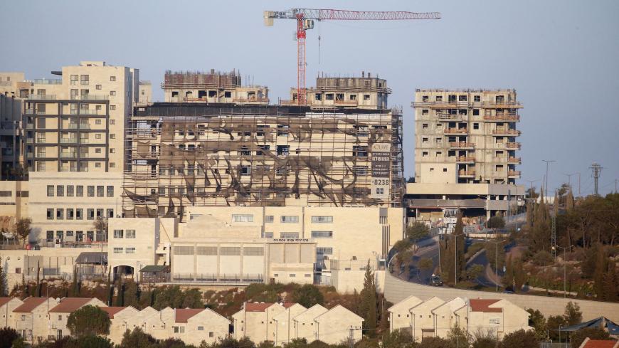 A picture taken on October 14, 2020, shows new buildings in the Israeli settlement of Efrat south of the city of Bethlehem in the occupied West Bank. (Photo by HAZEM BADER / AFP) (Photo by HAZEM BADER/AFP via Getty Images)