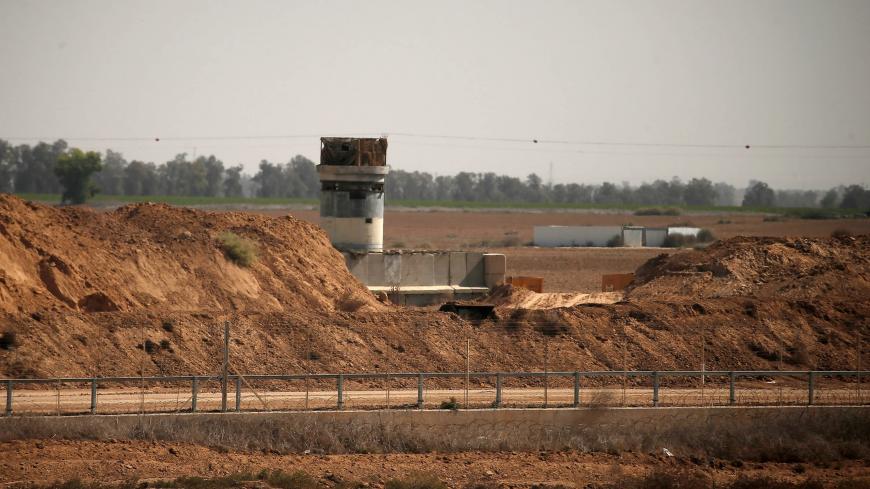 A picture taken on October 20, 2020, shows an Israeli observation post at the Gaza-Israel border, east of Khan Yunis in the southern Gaza Strip. - Israel on October retaliated with airstrikes against a rocket fired from the Gaza strip, after it said it had discovered a tunnel that crossed "dozens of meters (yards) into Israel from Gaza" leading from Palestinian into Israeli territory, the army said. (Photo by MAHMUD HAMS / AFP) (Photo by MAHMUD HAMS/AFP via Getty Images)