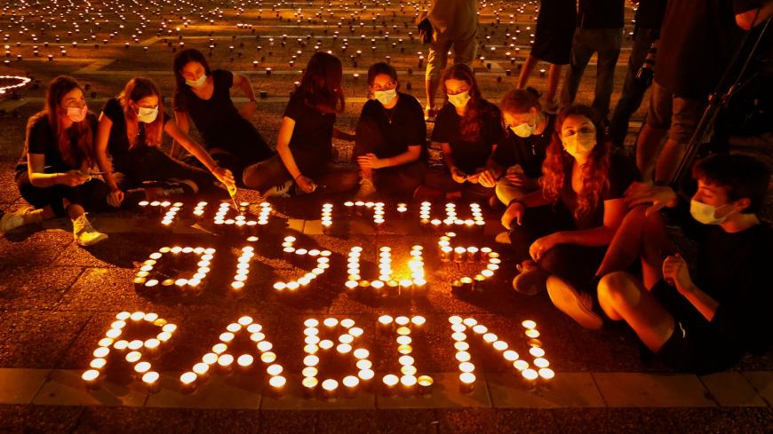 Israelis light 25,000 candles at Rabin Square in the Israeli coastal city Tel Aviv, on October 29, 2020, ahead of the 25th anniversary of the assassination of former Israeli Prime Minister Yitzhak Rabin, - Rabin was gunned down in Tel Aviv after a peace rally on November 4, 1995 by a right-wing Jewish extremist Yigal Amir. (Photo by JACK GUEZ / AFP) (Photo by JACK GUEZ/AFP via Getty Images)