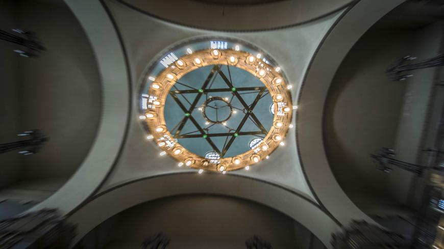A picture taken on October 3, 2016 shows a general view of the ceiling of the Shaar Hashamayim Synagogue in Cairo, also known as Temple Ismailia or Adly Synagogue.
Once a flourishing community, only a handful of Egyptian Jews, mostly elderly women, is all that remains in the Arab world's most populous country, aiming at least to preserve their heritage. Egypt still has about a dozen synagogues, but like many of the country's monuments they need restoration.
 / AFP PHOTO / KHALED DESOUKI        (Photo credit