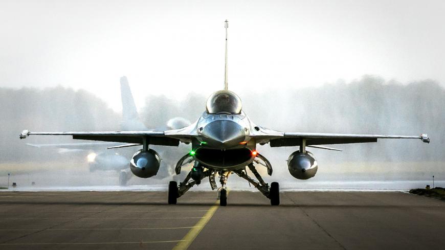 A F-16 jet fighter of Royal Dutch Air Force lands on the runway of Volkel air base, southern Netherlands, on January 2, 2019. - The Dutch Air Force took part in the Air Task Force Middle East mission to fight against ISIS in Iraq and Eastern Syria. (Photo by Remko de Waal / ANP / AFP) / Netherlands OUT        (Photo credit should read REMKO DE WAAL/AFP via Getty Images)