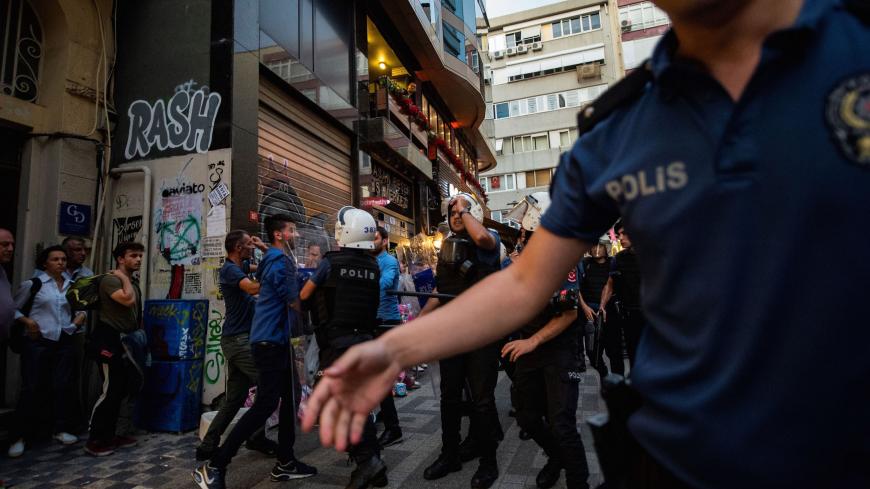 EDITORS NOTE: Graphic content / A protester is detained by police during a demonstration against the replacement of Kurdish mayors with state officials in three cities, on August 20, 2019, in Istanbul. - The Turkish government removed three mayors from office on August 19 over alleged links to Kurdish militants as Ankara deepened its crackdown on the opposition. The mayors of Diyarbakir, Mardin and Van provinces in eastern Turkey -- all members of the pro-Kurdish Peoples' Democratic Party (HDP) elected in M