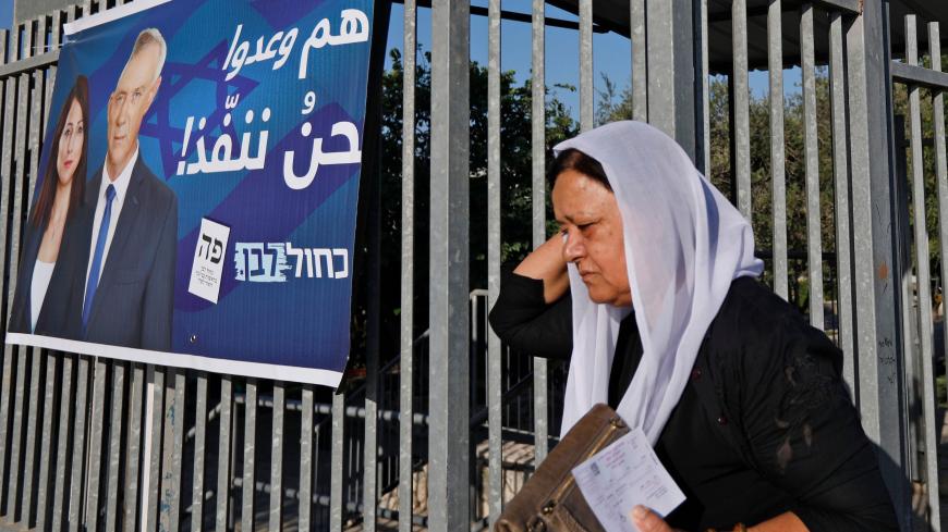 A member of the Israeli Druze community leaves after casting her vote during Israel's parliamentary elections on September 17, 2019, in Daliyat al-karmel in northern Israel. (Photo by JALAA MAREY / AFP)        (Photo credit should read JALAA MAREY/AFP via Getty Images)