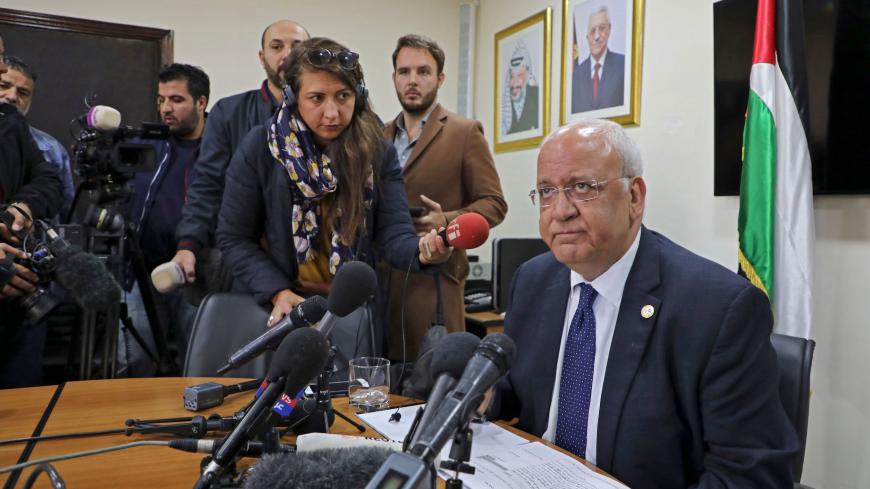 Saeb Erekat (R), Secretary General of the Palestine Liberation Organization (PLO) and chief Palestinian negotiator, speaks during a press conference in the Palestinian West Bank city of Ramallah on November 19, 2019. - Israelis reacted joyfully on November 19 to the United States's announcement it no longer considers settlements in the West Bank and east Jerusalem illegal, but the Palestinians pledged fresh measures to oppose the declaration. Erekat said it was only the latest move by the US to try and forc