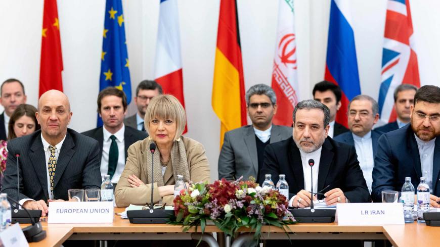 Iranian political deputy at the Ministry of Foreign Affairs of Iran Abbas Araghchi (C-R), and German Secretary General of the European External Action Service (EEAS) Helga Maria Schmid (C-L) attend a meeting of the Joint Commission on Iran's nuclear program (JCPOA) at EU Delegation to the International Organizations office in Vienna, Austria, on December 6, 2019. (Photo by JOE KLAMAR / AFP) (Photo by JOE KLAMAR/AFP via Getty Images)