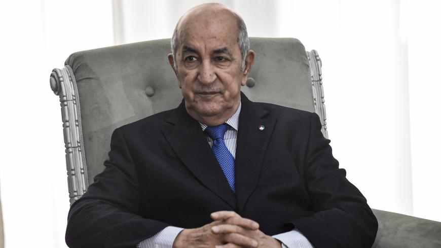 Algerian President Abdelmadjid Tebboune meets with the visiting French Foreign Minister (unseen) in the capital Algiers on January 21, 2020. - Le Drian arrived to Algiers for a brief visit to discuss bilateral and regional issues, starting with the Libyan crisis and the Sahel. (Photo by RYAD KRAMDI / AFP) (Photo by RYAD KRAMDI/AFP via Getty Images)