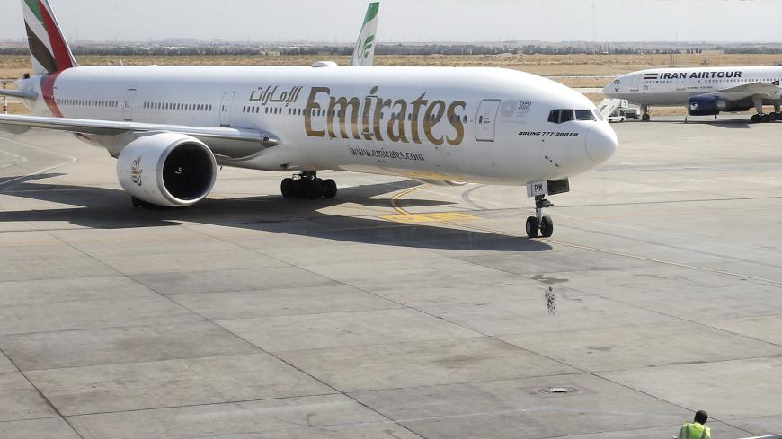 This picture taken on July 17, 2020 shows an Emirates Boeing 777-31H aircraft taxying upon arrival at the Iranian capital Tehran's Imam Khomeini International Airport. - The UAE's Emirates airlines landed its first flight in Tehran on July 17 after a five month shutdown due to the novel coronavirus pandemic. (Photo by - / AFP) (Photo by -/AFP via Getty Images)