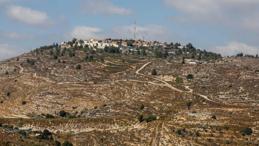 A picture taken on October 14, 2020 shows a general view of the Israeli settlement of Psagot on the eastern outskirts of Ramallah in the occupied West Bank. - Israel approved 2,166 new homes in settlements across the occupied West Bank, official figures sent to AFP showed, ending an eight-month lull in settlement expansion. The approvals came less than a month after the United Arab Emirates and Bahrain signed agreements to normalise relations with Israel, which in return pledged to freeze its plans to annex
