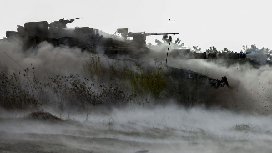 Israeli soldiers take part in military exercises near the northern Elyakim area on October 14, 2020, during a simulation to protect the country's northern border. (Photo by Emmanuel DUNAND / AFP) (Photo by EMMANUEL DUNAND/AFP via Getty Images)