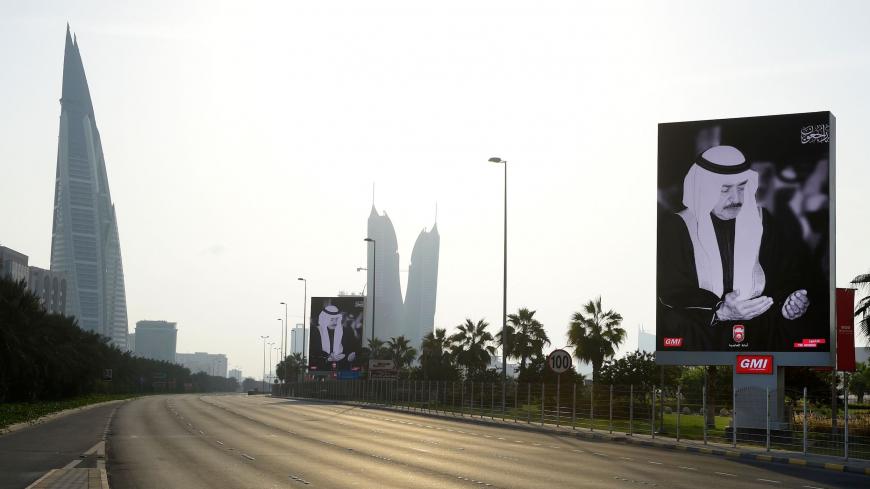 Street billboards mourning the death of Bahraini Prime Minister, Prince Khalifa bin Salman al-Khalifa, line a highway in the capital Manama, on November 11, 2020. - Bahrain's Prince Khalifa bin Salman al-Khalifa, the world's longest-serving prime minister who had held the post since independence in 1971, died at the age of 84, state media announced. (Photo by Mazen Mahdi / AFP) (Photo by MAZEN MAHDI/AFP via Getty Images)
