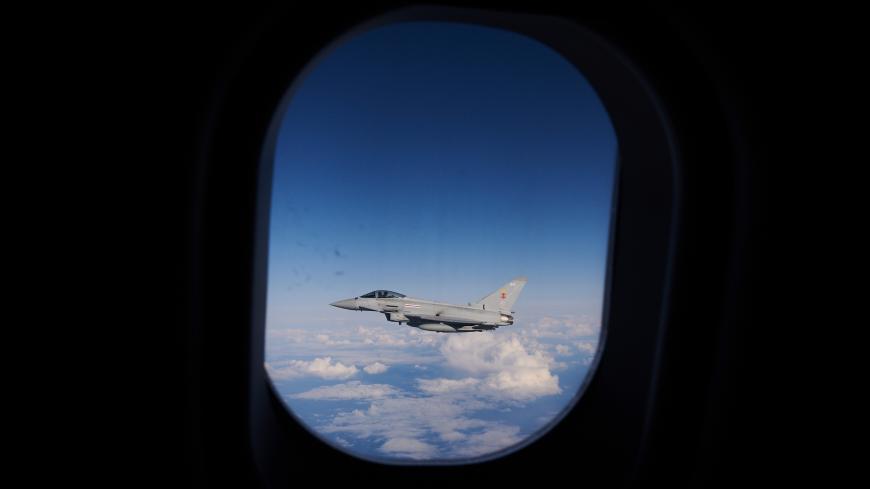IN FLIGHT, SCOTLAND - OCTOBER 08: An RAF Typhoon combat aircraft departs after refueling from an RAF Voyager aircraft over the North Sea on October 08, 2020 in flight, above Scotland. The first air-to-air refuelling of F-35Bs from the newly-formed Carrier Strike Group took place as part of Operation Joint Warrior. Flying from HMS Queen Elizabeth, the RAF, RN and USMC Pilots (USofA) were demonstrating the operational capabilities of NATO and the UK for current and future threats. Operation Joint Warrior took