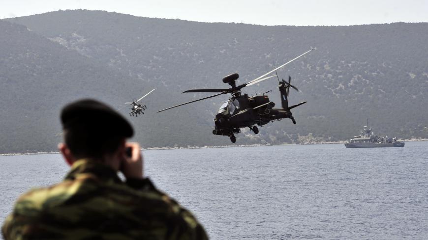 Greek special forces participate in a military exercise, code name 'pyrpolitis', in the Aegean sea on April 6, 2012. AFP PHOTO / ARIS MESSINIS (Photo credit should read ARIS MESSINIS/AFP via Getty Images)