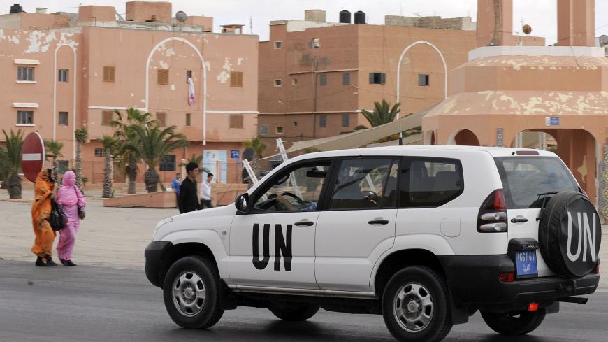 A United Nations car drives past the Mechouar square on May 14, 2013 in Laayoune, the capital of Moroccan-controlled Western Sahara. Six Sahrawi activists arrested this month after pro-independence protests in Western Sahara said they were tortured by Moroccan police and made to sign confessions, Amnesty International charged on May 16, 2013.  AFP PHOTO /FADEL SENNA / AFP / FADEL SENNA        (Photo credit should read FADEL SENNA/AFP via Getty Images)