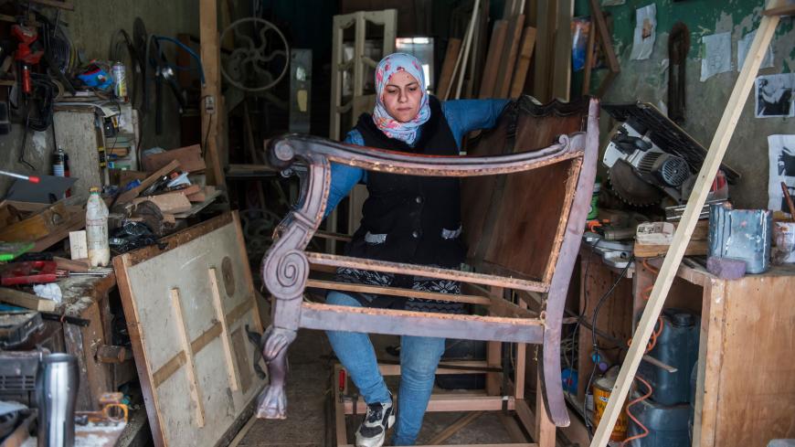 Asmaa Megahed a 31-year-old Egyptian carpenter works at her atelier in the Abdeen district of downtown Cairo on February 26, 2018. / AFP PHOTO / KHALED DESOUKI        (Photo credit should read KHALED DESOUKI/AFP via Getty Images)