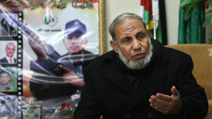Hamas leader Mahmud Zahar speaks during an interview with AFP at his house in Gaza City on December 15, 2010. The Arab League meeting on the stalled Israeli-Palestinian peace process was nothing more than "a cover for the failure" of the Palestinian Authority, Zahar said. AFP PHOTO/MAHMUD HAMS (Photo credit should read MAHMUD HAMS/AFP via Getty Images)