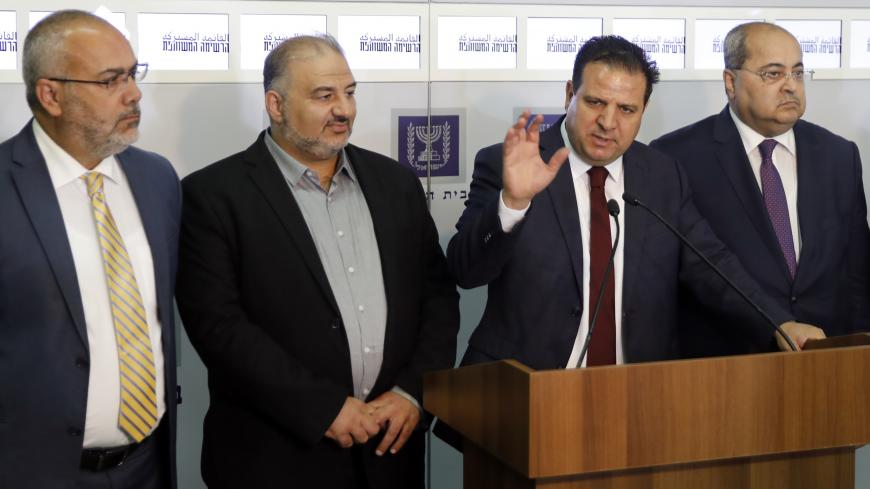 Members of the Joint List Ayman Odeh (C) speaks to the press in the presence of Ahmad Tibi (R), Osama Saadi (L) and Mansour Abbas (2nd-L) following their consulting meeting with Israeli President, to decide who to task with trying to form a new government, in Jerusalem on September 22, 2019. (Photo by Menahem KAHANA / AFP)        (Photo credit should read MENAHEM KAHANA/AFP via Getty Images)