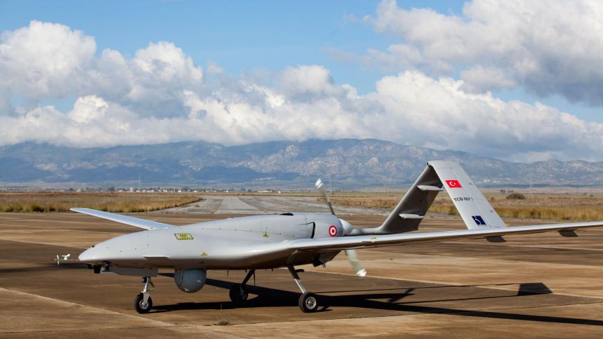 The Turkish-made Bayraktar TB2 drone is pictured on December 16, 2019 at Gecitkale military airbase near Famagusta in the self-proclaimed Turkish Republic of Northern Cyprus (TRNC). - The Turkish military drone was delivered to northern Cyprus amid growing tensions over Turkey's deal with Libya that extended its claims to the gas-rich eastern Mediterranean. The Bayraktar TB2 drone landed in Gecitkale Airport in Famagusta around 0700 GMT, an AFP correspondent said, after the breakaway northern Cyprus governm