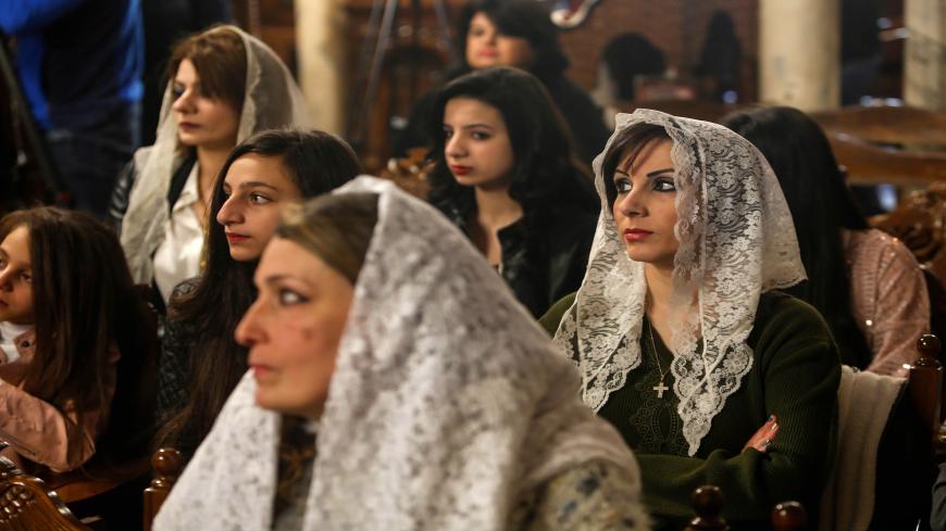 Palestinian Orthodox Christians attend a Christmas Mass at the Church of Saint Porphyrius in Gaza City on January 7, 2020. (Photo by MOHAMMED ABED / AFP) (Photo by MOHAMMED ABED/AFP via Getty Images)