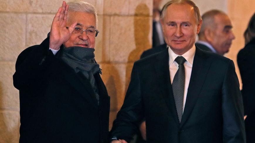Russian President Vladimir Putin (R) meets with his Palestinian counterpart Mahmud Abbas in the West Bank city of Bethlehem on January 23, 2020. (Photo by Ahmad GHARABLI / AFP) (Photo by AHMAD GHARABLI/AFP via Getty Images)