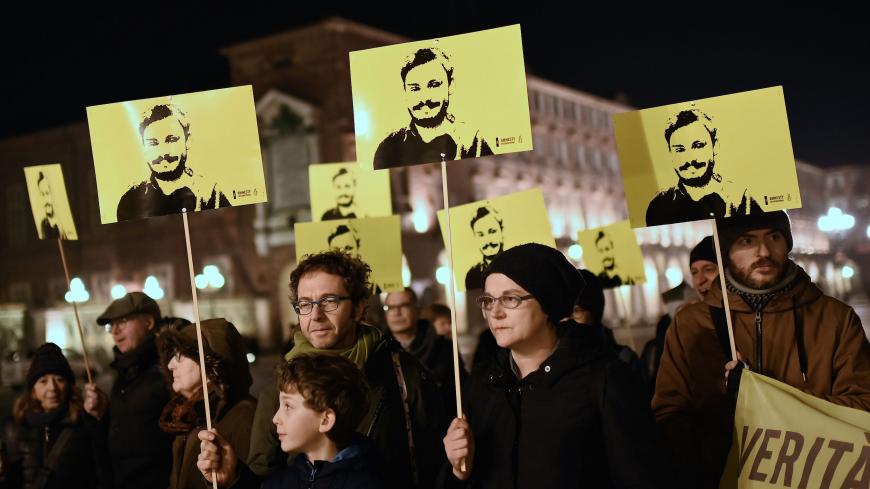 Activists of human rights organization Amnesty International (AI) take part in a demonstration in Piazza Castello in Turin on January 25, 2020, to mark the fourth anniversary since the disappearance of Italian student Giulio Regeni. - Regeni, a 28-year-old Cambridge University PhD student from Italy, disappeared on January 25, 2016 in central Cairo, as police were out in force in anticipation of protests that day. His body was later found by the side of a road bearing signs of torture. He had been researchi