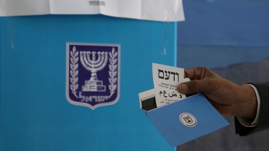 Arab Israeli MP and Arab Joint List candidate Said al-Harumi votes in the Bedouin town of Segev Shalom or Shaqib al-Salam near the southern Israeli city of Beersheva on March 2, 2020. - Israelis were voting for a third time in 12 months today, with embattled Prime Minister Benjamin Netanyahu seeking to end the country's political crisis and save his career. (Photo by HAZEM BADER / AFP) (Photo by HAZEM BADER/AFP via Getty Images)