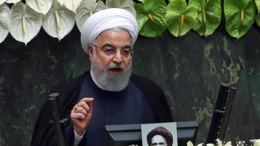 Iranian President Hassan Rouhani delivers a speech during the inaugural session of the new parliament following February elections, in Tehran on May 27, 2020. - The 11th legislature since the Islamic revolution of 1979 opened as the country's economy, which has been hard hit by the novel coronavirus, gradually returns to normal. Rouhani, who is in the final year of his second and final term, called on MPs, collectively and individually, to place the "national interest above special interests", "party intere