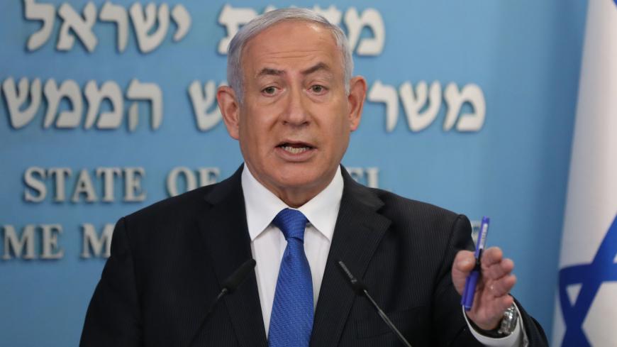 Israeli Prime Minister Benjamin Netanyahu gives a press conference in Jerusalem on August 13, 2020. - Israel and the UAE agreed to normalise relations in a landmark US-brokered deal, only the third such accord the Jewish state has struck with an Arab nation. The agreement, first announced by US President Donald Trump on Twitter, will see Israel halt its plan to annex large parts of the occupied West Bank, according to the UAE. (Photo by Abir SULTAN / POOL / AFP) (Photo by ABIR SULTAN/POOL/AFP via Getty Imag