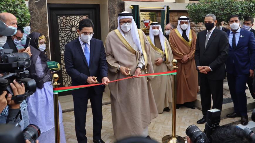 Moroccan Foreign Minister Nasser Bourita (L) and his Bahraini counterpart Abdellatif al-Zayani (R), inaugurate Bahrain's consulate in Laayoun, the main city in Morocco's disputed region of Western Sahara, on december 14, 2020. - Bahrain opened the consulate in Western Sahara, as Morocco steps up a diplomatic push to strengthen its position in the disputed territory. Bahrain's King Hamad told Moroccan King Mohamed VI of the decision to open a mission in the coastal city of Laayoune during a phone call, the M