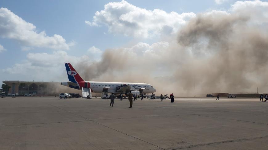 Smoke billows at the Aden Airport on December 30, 2020, after explosions rocked the Yemeni airport shortly after the arrival of a plane carrying members of a new unity government. - Explosions rocked Yemen's Aden airport on Wednesday shortly after the arrival of a plane carrying members of a new unity government, an AFP correspondent at the scene said. "At least two explosions were heard as the cabinet members were leaving the aircraft," the correspondent said. Yemen's internationally recognised government 