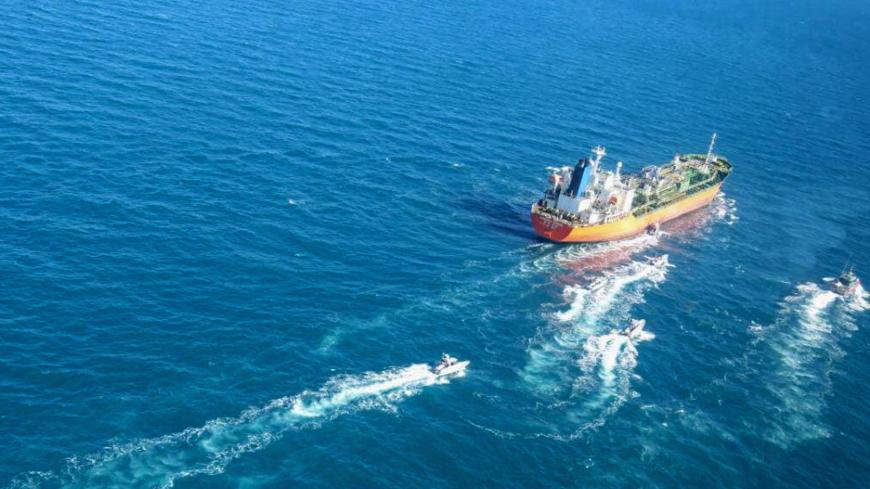 A picture obtained by AFP from the Iranian news agency Tasnim on January 4, 2021, shows the South Korean-flagged tanker being escorted by Iran's Revolutionary Guards navy after being seized in the Gulf. - "A Korean ship was seized in Persian Gulf waters by the Revolutionary Guard's navy and transferred to our country's ports," Fars news agency said without naming the vessel. "This tanker had a South Korea flag and was seized over oil pollution and environmental hazards," it added. (Photo by - / TASNIM NEWS 