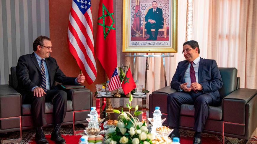 David Schenker, US Assistant Secretary of State for Near Eastern Affairs, (L) meets with Moroccan Foreign Minister Nasser Bourita during a meeting in Dakhla in Morocco-administered Western Sahara, on January 10, 2021. - Schenker is visiting the contested Western Sahara after Washington recognised Morocco's sovereignty there in exchange for Rabat normalising ties with Israel. Western Sahara is a disputed and divided former Spanish colony, mostly under Morocco's control, where tensions with the pro-independen