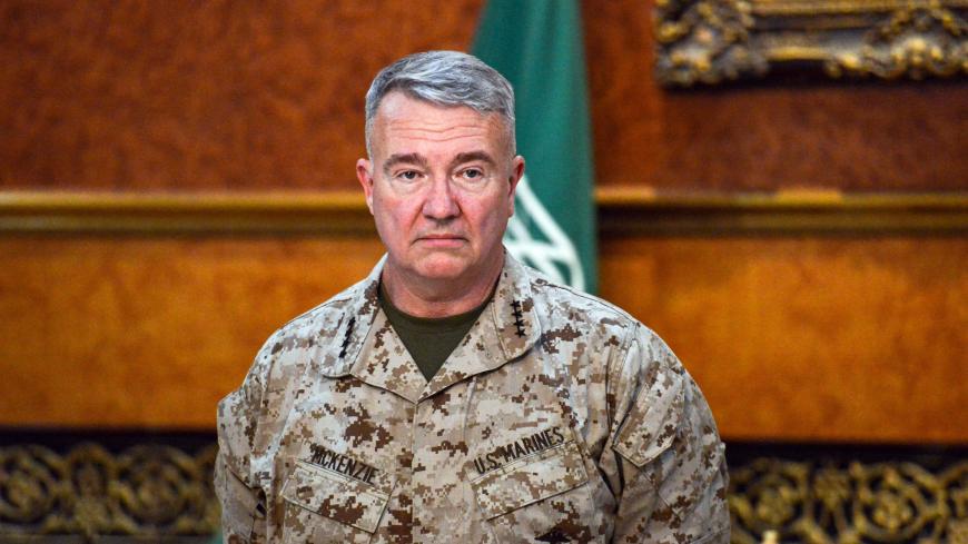 US Marine Corps General Kenneth F. McKenzie Jr., Commander of the US Central Command (CENTCOM), poses for a picture during his visit to a military base in al-Kharj in central Saudi Arabia on July 18, 2019. - McKenzie pledged on July 18 to work "aggressively" to ensure maritime safety in strategic Gulf waters after a spate of attacks blamed on Iran. McKenzie's visit to Saudi Arabia comes a day after the US House voted to block $8.1 billion in arms sales to the kingdom and other allies, in a move likely to be