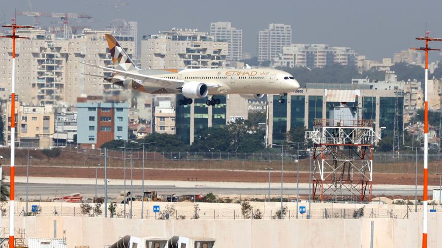 An Etihad Airways Boeing 787-9 "Dreamliner" aircraft carrying a delegation from the United Arab Emirates (UAE) on a first official visit, lands at Israel's Ben Gurion Airport near Tel Aviv, on October 20, 2020. - The UAE delegation left on the country's first official visit to Israel with a string of deals set to be signed after the two countries signed a deal to normalise ties last month. (Photo by JACK GUEZ / AFP) (Photo by JACK GUEZ/AFP via Getty Images)