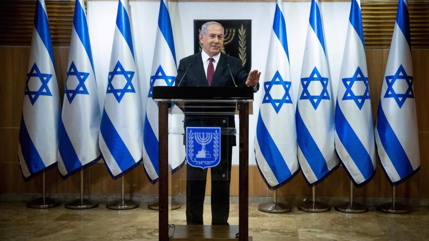 Israeli Prime Minister Benjamin Netanyahu delivers a speech at the Knesset (Israeli Parliament) in Jerusalem on December 22, 2020. (Photo by Yonathan SINDEL / POOL / AFP) (Photo by YONATHAN SINDEL/POOL/AFP via Getty Images)