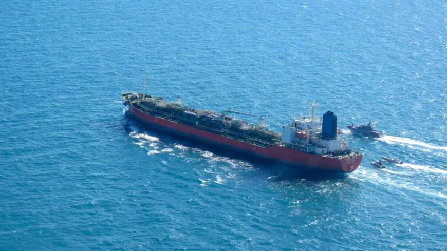 A picture obtained by AFP from the Iranian news agency Tasnim on January 4, 2021, shows the South Korean-flagged tanker being escorted by Iran's Revolutionary Guards navy after being seized in the Gulf. - "A Korean ship was seized in Persian Gulf waters by the Revolutionary Guard's navy and transferred to our country's ports," Fars news agency said without naming the vessel. "This tanker had a South Korea flag and was seized over oil pollution and environmental hazards," it added. (Photo by - / TASNIM NEWS 