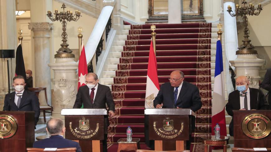 Foreign Ministers of (L to R) Germany Heiko Maas, Jordan Ayman Safadi, Egypt Sameh Shoukry, and France Jean-Yves Le Drian, hold a joint press conference after a meeting to discuss the Middle East peace process, in the Egyptian capital Cairo, on January 11, 2021. (Photo by Khaled DESOUKI / AFP) (Photo by KHALED DESOUKI/AFP via Getty Images)