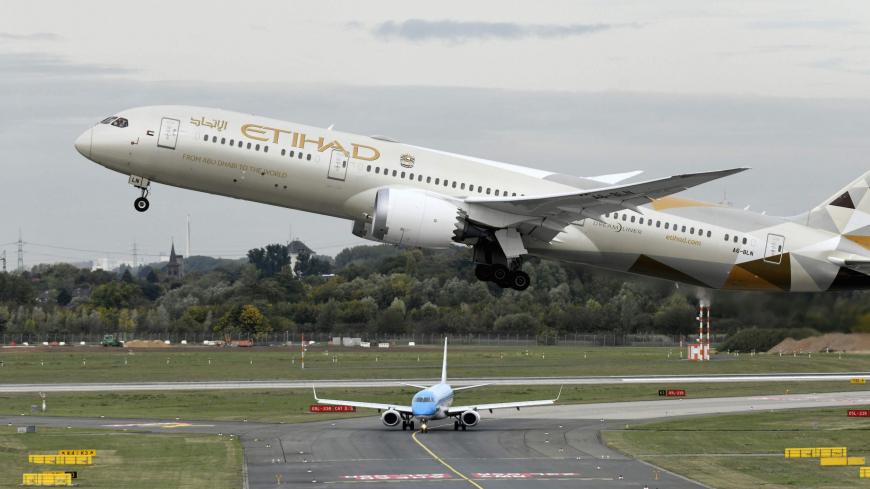 TOPSHOT - This picture shows a Boeing 787-10 Dreamliner of the Etihad airline during take-off on September 24, 2019 at the airport in Duesseldorf, western Germany. (Photo by Ina FASSBENDER / AFP) (Photo by INA FASSBENDER/AFP via Getty Images)
