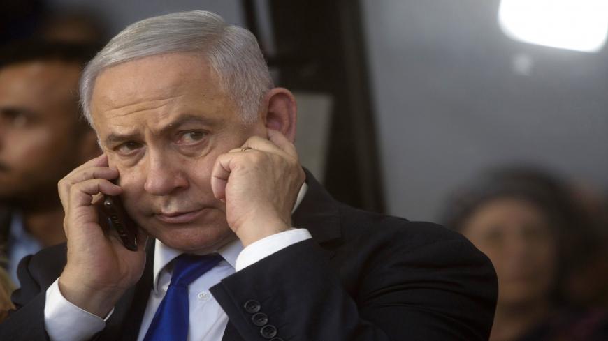 HEBRON, WEST BANK - SEPTEMBER 04: Israeli Prime Minister Benjamin Netanyahu speaks on the phone during an event marking the anniversary of the 1929 killing of 67 Jews by Palestinian rioters, on September 04, 2019 in Hebron, West Bank. Netanyahu is visiting Hebron ahead of Israel's elections on September 17th. (Photo by Lior Mizrahi/Getty Images)