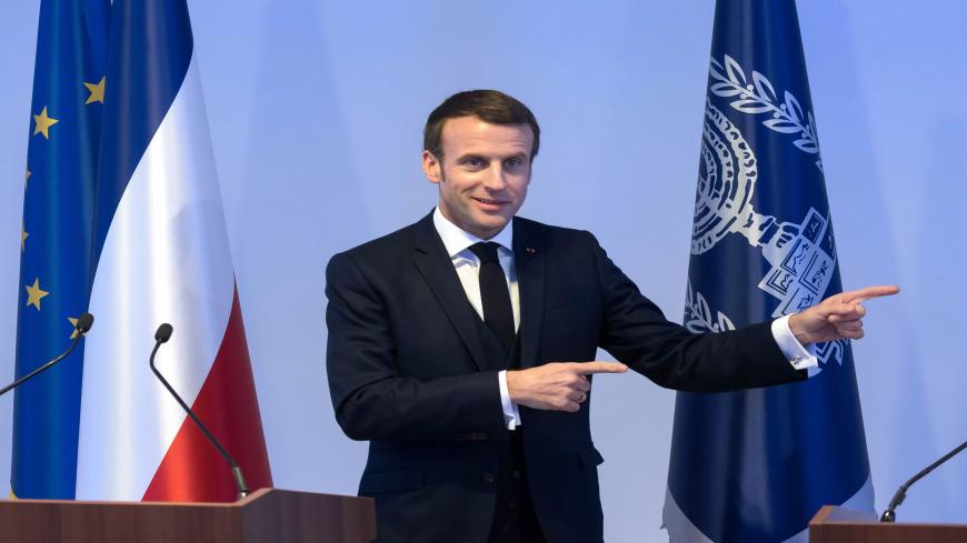 French President Emmanuel Macron gestures alongside the Israeli President as they address a press conference in Jerusalem on January 22, 2020, - Israel will lobby key leaders at this week's 75th anniversary of the liberation of Auschwitz on what it considers one of the gravest modern threats to the Jewish people: Iran. Prime Minister Benjamin Netanyahu was meeting Russian President Vladimir Putin, Emmanuel Macron of France and top US officials before an event at the Yad Vashem Holocaust memorial centre in J