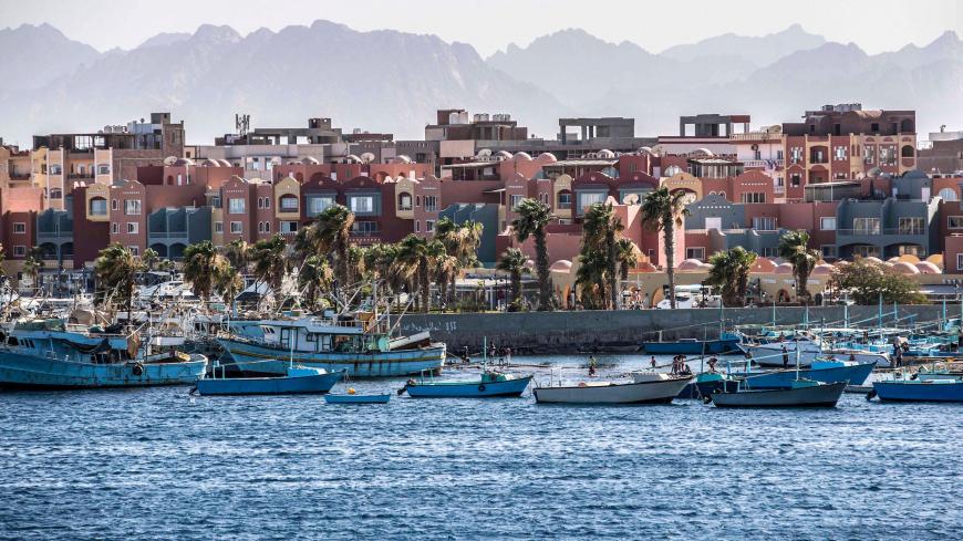 This picture taken on June 19, 2020 from a ferry shows a view of the Hurghada Marina in Egypt's southern Red Sea resort city, with the Red Sea hills seen in the background. (Photo by Khaled DESOUKI / AFP) (Photo by KHALED DESOUKI/AFP via Getty Images)