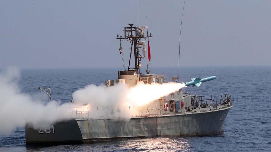 A handout picture provided by the Iranian Army's official website on September 11, 2020, shows an Iranian Nasr missile being fired from a navy warship during the second day of a military exercise in the Gulf, near the strategic strait of Hormuz in southern Iran. - The Iranian navy began on September 10 a three-day exercise in the Sea of Oman near the strategic Strait of Hormuz, deploying an array of warships, drones and missiles. One of the exercise's objectives is to devise "tactical offensive and defensiv