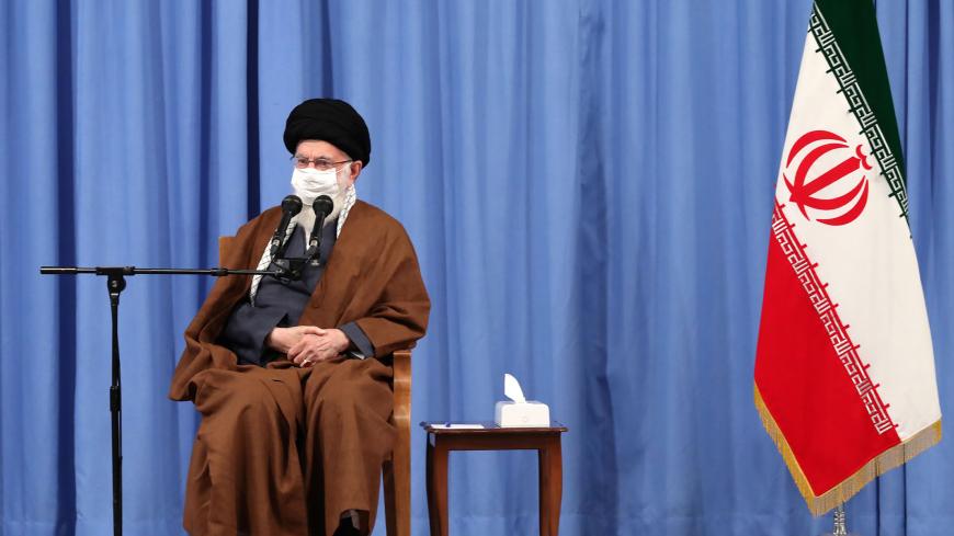 A handout picture provided by the office of Iran's Supreme Leader Ayatollah Ali Khamenei on October 24, 2020, shows him wearing a protective face mask as he gives a speech in the capital Tehran during a meeting of the national staff to discuss the issue of the novel coronavirus pandemic crisis. (Photo by - / KHAMENEI.IR / AFP) / XGTY / === RESTRICTED TO EDITORIAL USE - MANDATORY CREDIT "AFP PHOTO / HO / KHAMENEI.IR" - NO MARKETING NO ADVERTISING CAMPAIGNS - DISTRIBUTED AS A SERVICE TO CLIENTS === (Photo by 